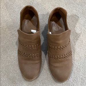 Tan booties with V cut on sides